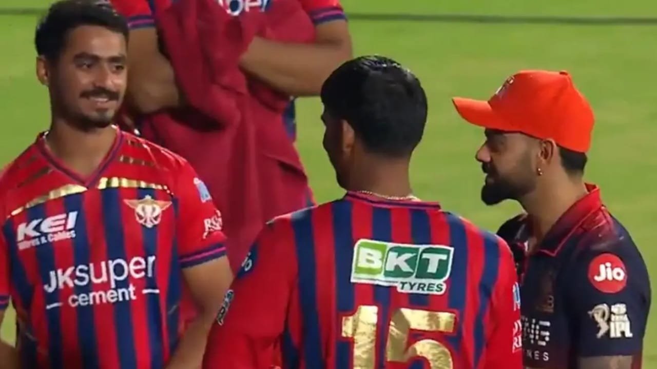 కోహ్లీ కాళ్లు తాకిన లక్నో ప్లేయర్.. కింగ్ రియాక్షన్ వైరల్!